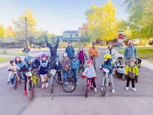 Walk and Roll event with children and parents biking to school