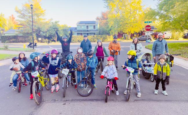 Walk and Roll event with children and parents biking to school
