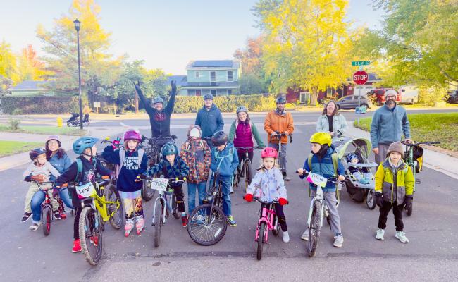 Walk and Roll event with children and parents biking to school