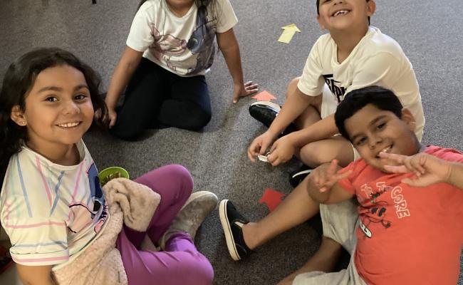 2nd grade students in circle on the floor